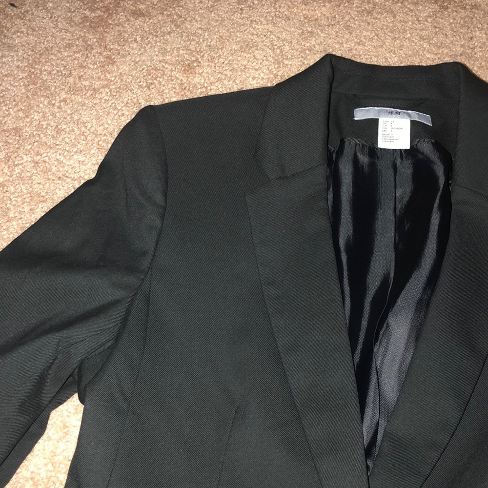 Womens sleek black suit jacket